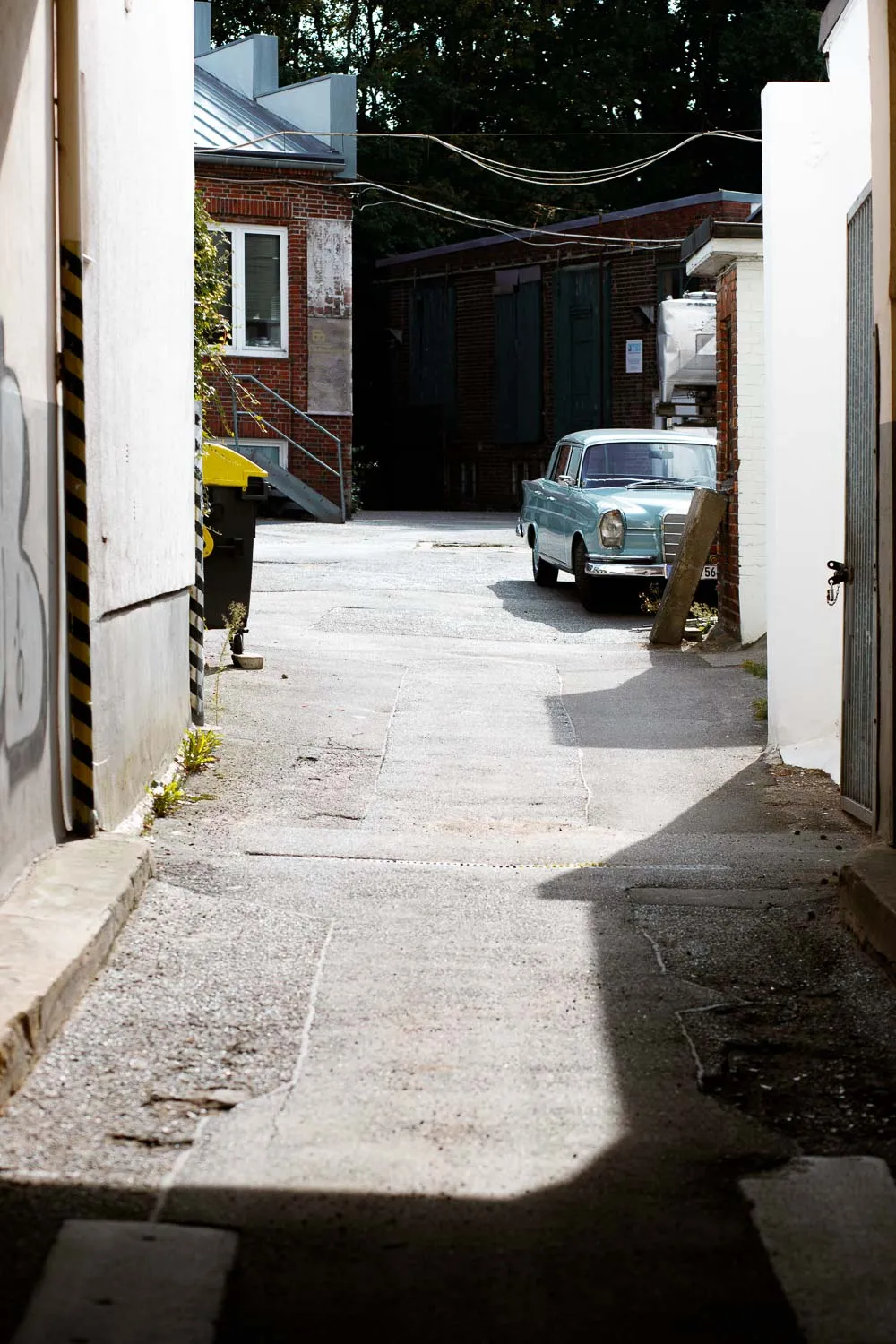 Old car in alley